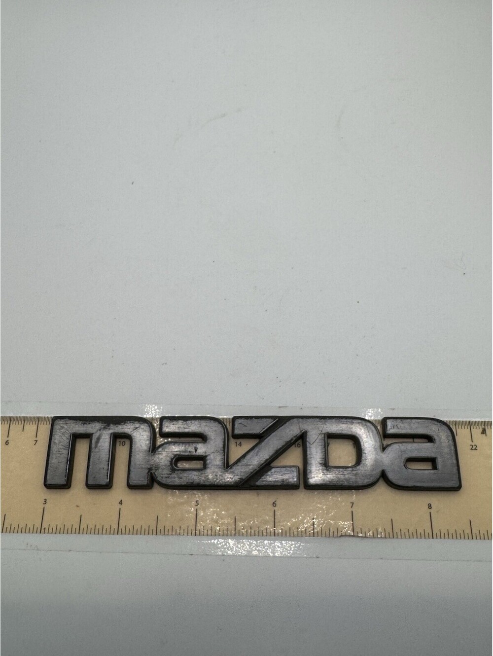 Mazda Emblem Plastic